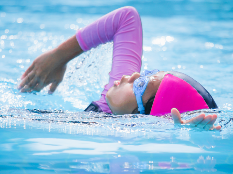 Girl Lap Swimming in Pool Girl Lap Swimming in Pool