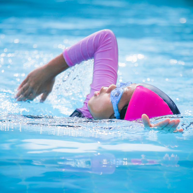 Girl Lap Swimming in Pool