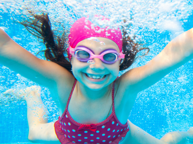 Girl Smiling Underwater Girl Smiling Underwater