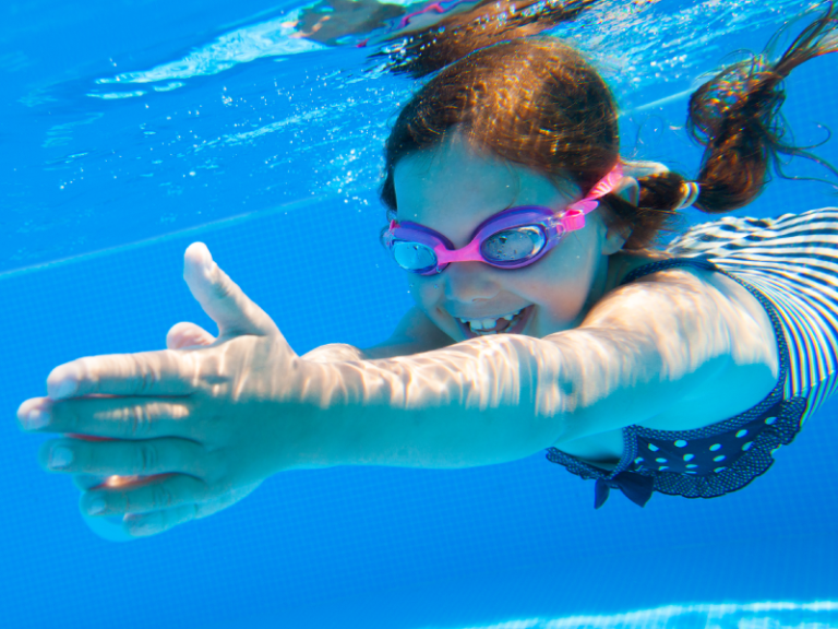 Girl Swimming Underwater Girl Swimming Underwater