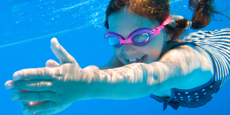 Girl Swimming Underwater Girl Swimming Underwater